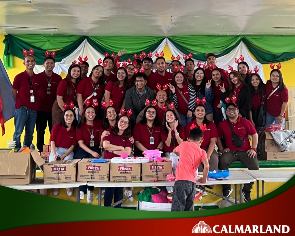 Calmarland employees united in a holiday outreach event, promoting community development and shared joy.